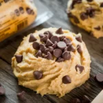 A side-by-side comparison of homemade cookie dough and store-bought cookie.