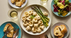 Alfredo Tortellini served ,with garlic bread ,and Caesar salad.