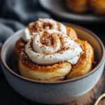 Soft cinnamon rolls with heavy cream, golden brown and fluffy.