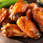 Perfectly crispy chicken wings on a restaurant plate