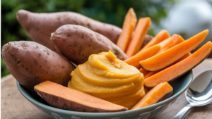 Sweet potatoes on a kitchen counter with a focus on nutrition and weight management.