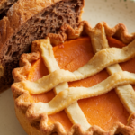 Sweet potato and bread slices on a wooden table, showcasing their nutritional differences.