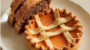 Sweet potato and bread slices on a wooden table, showcasing their nutritional differences.