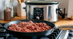 Do you have to brown ground beef before slow cooker