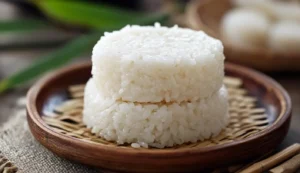 A bodybuilder eating rice cakes as a snack after workout.